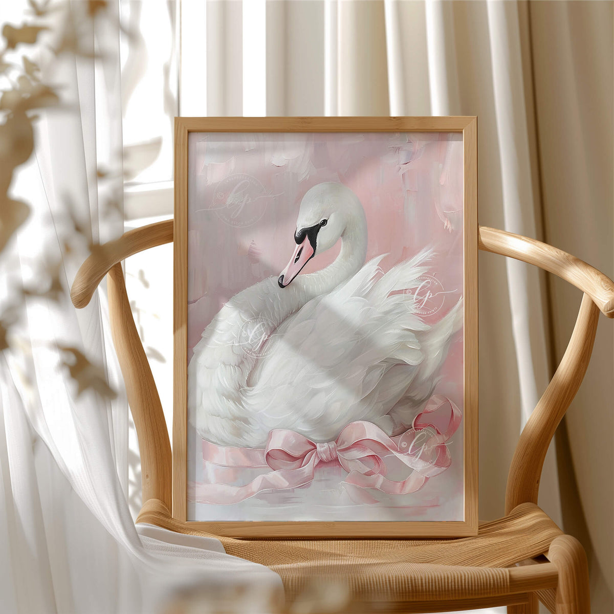 Swan with pink bow around it